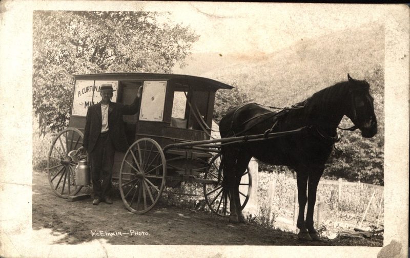 A. Curtin Miller with his horse-drawn milk wagon. Used in "Second Century," page 31.